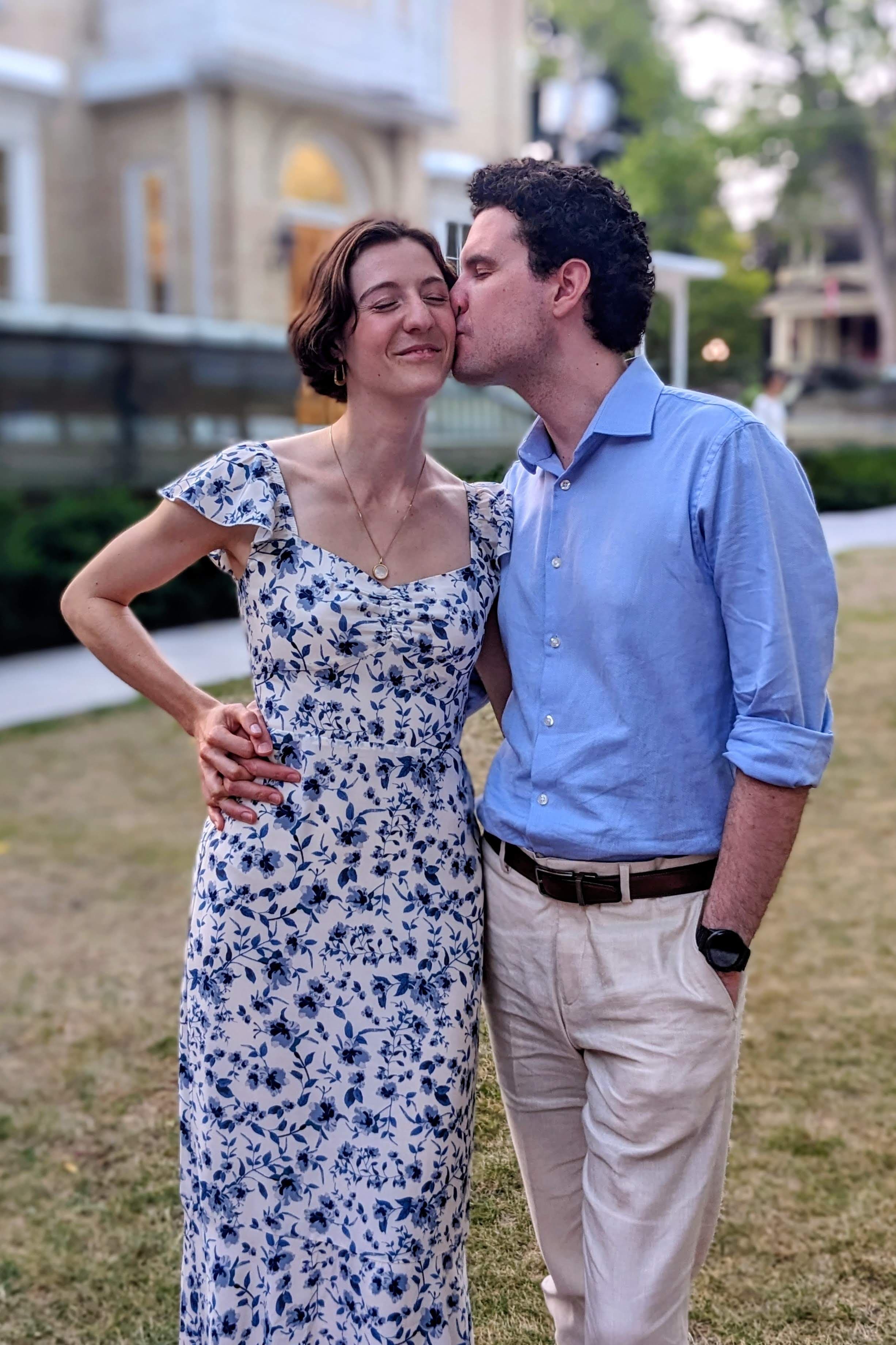 Seb kissing Raina outdoors
